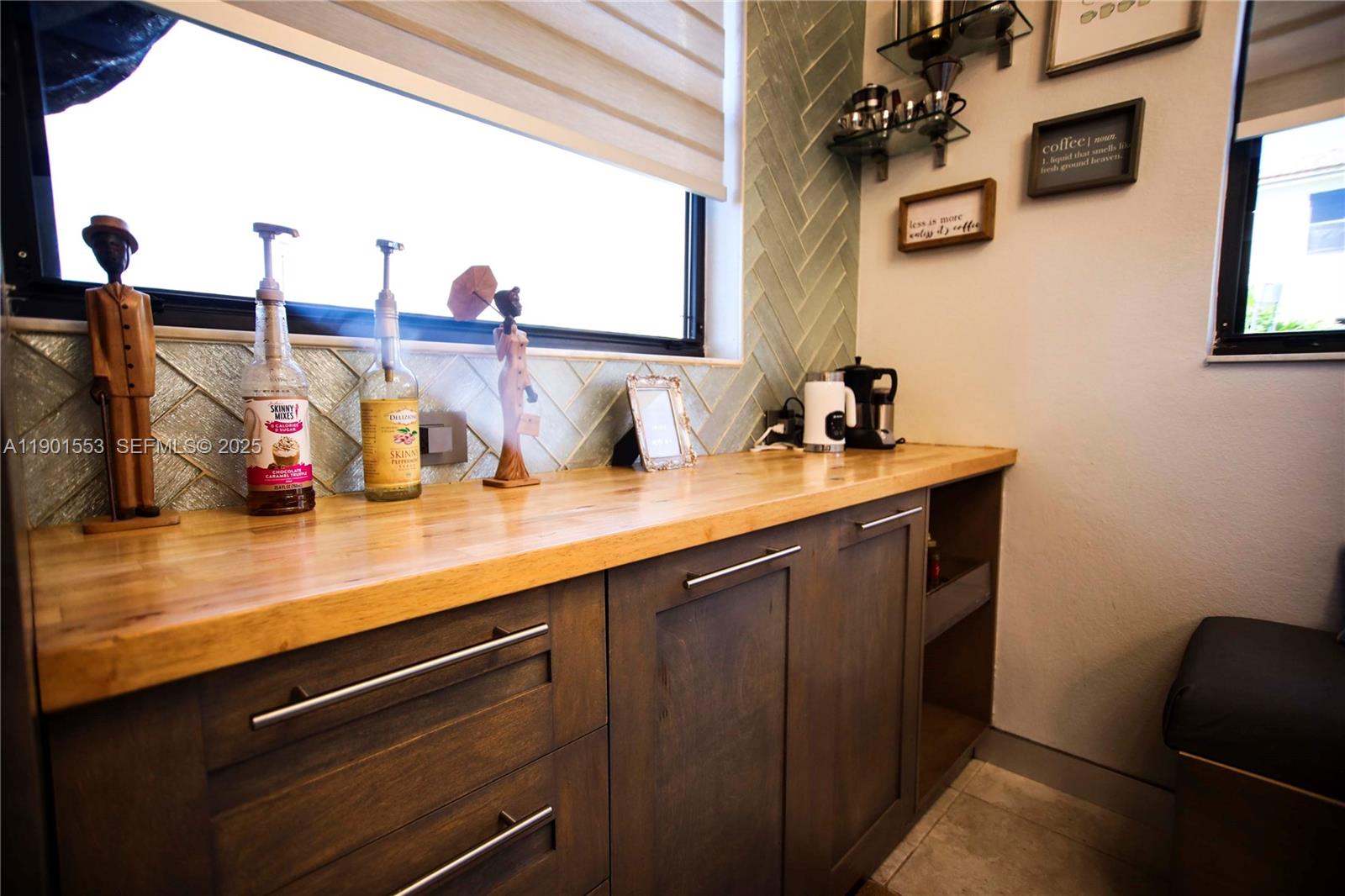 11863 Southwest 233rd Terrace Homestead, FL 33032 - Photo 25 of 77 a bathroom with a sink and a mirror
