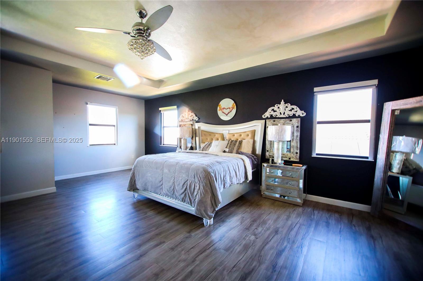 11863 Southwest 233rd Terrace Homestead, FL 33032 - Photo 47 of 77 a bedroom with a bed and a window