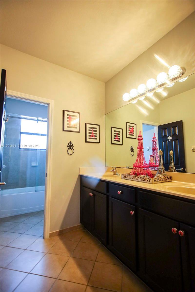 11863 Southwest 233rd Terrace Homestead, FL 33032 - Photo 58 of 77 a room with a sink and cabinets