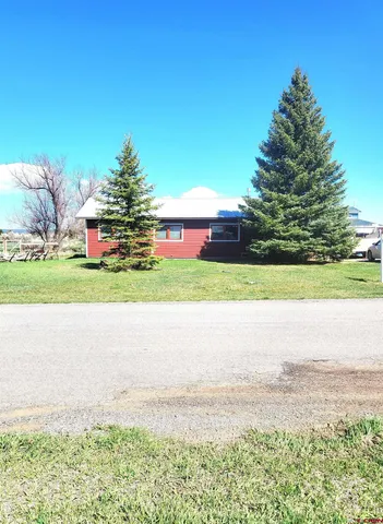 a view of an ocean and a yard