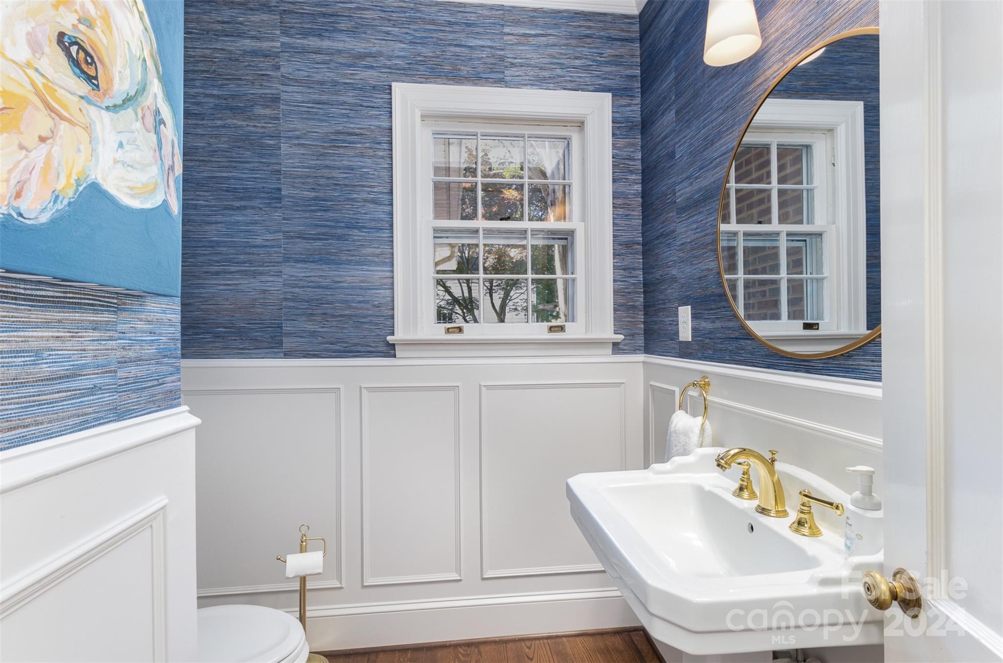 1900 South Wendover Road Charlotte, NC 28211 - Photo 16 of 38 a bathroom with a sink and a window