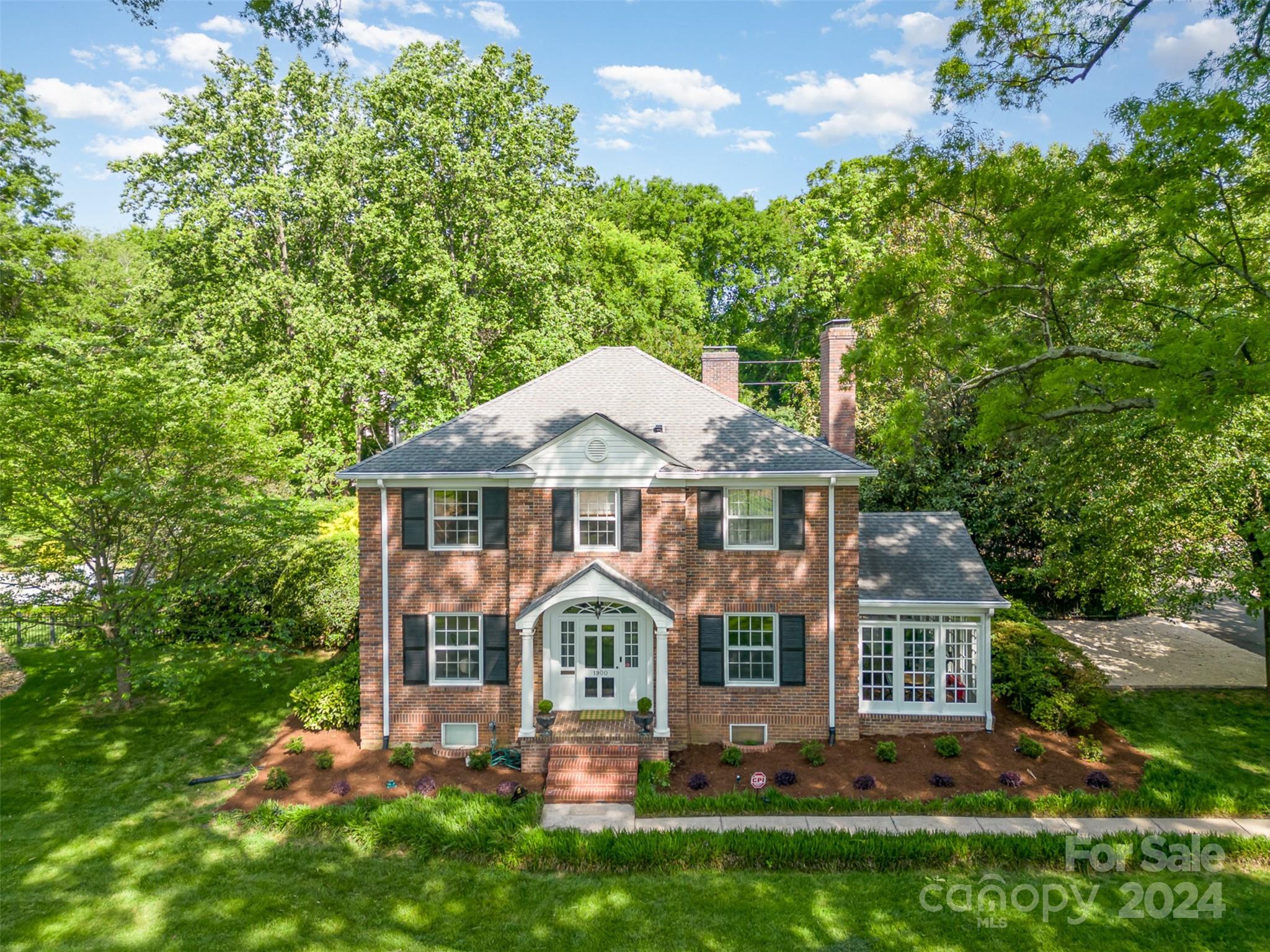 1900 South Wendover Road Charlotte, NC 28211 - Photo 2 of 38 front view of a house with a yard