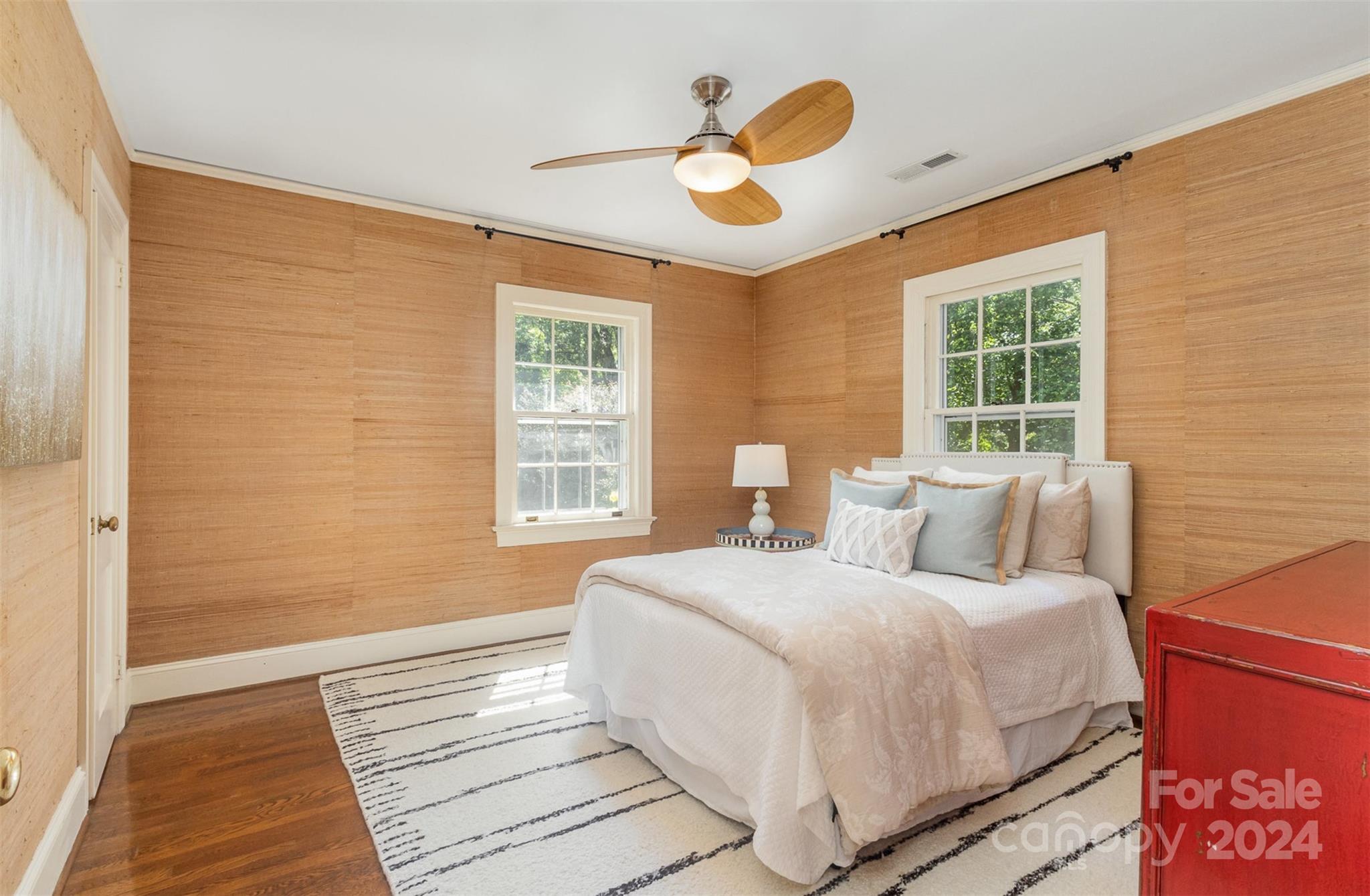 1900 South Wendover Road Charlotte, NC 28211 - Photo 22 of 38 a bedroom with a large bed and a large window