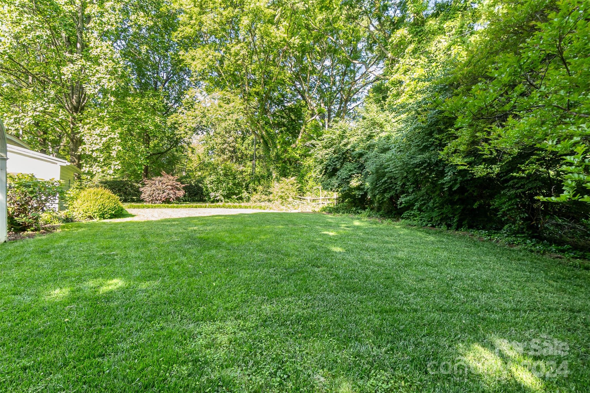 1900 South Wendover Road Charlotte, NC 28211 - Photo 33 of 38 a view of green field with trees in the background