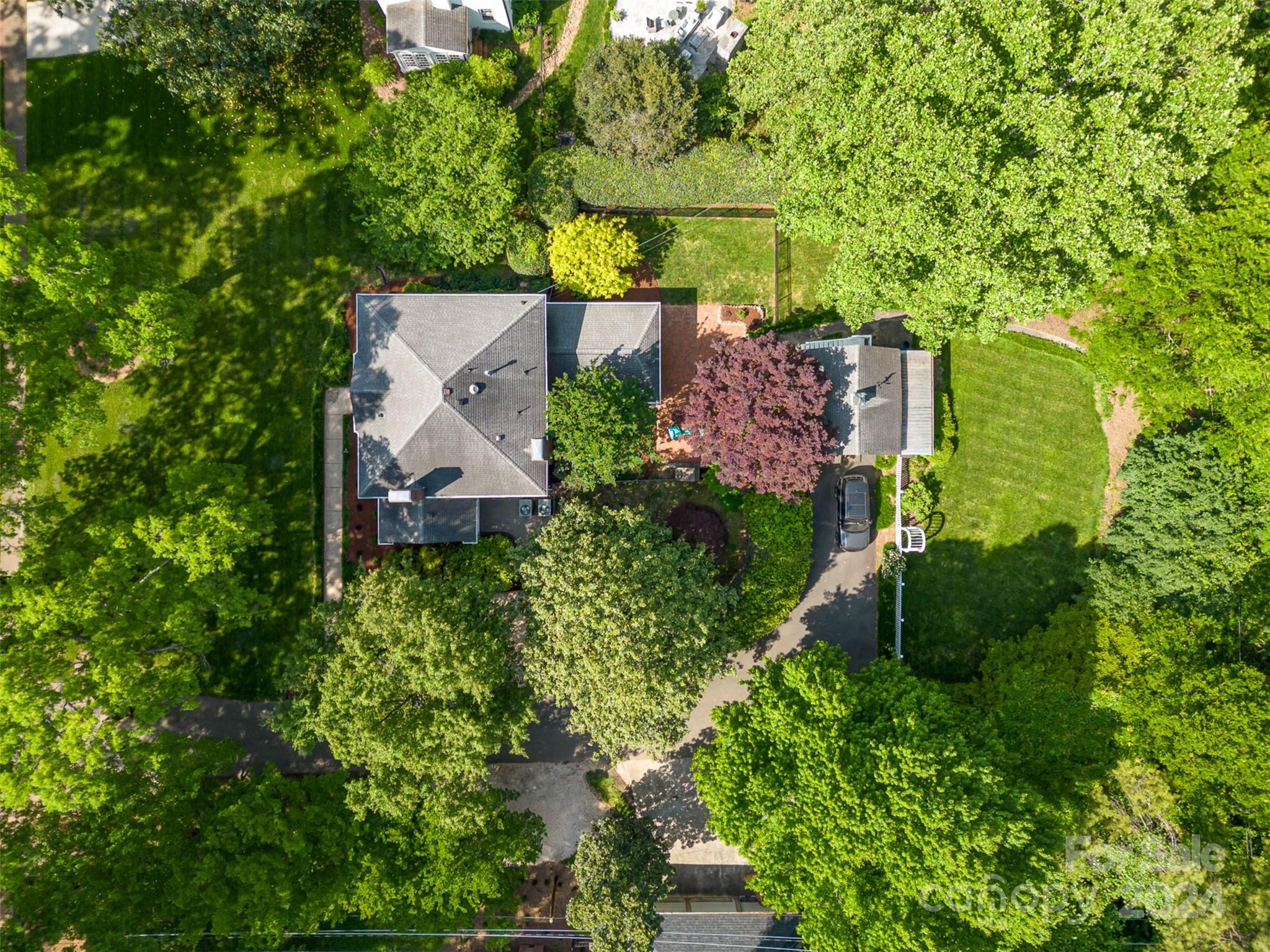 1900 South Wendover Road Charlotte, NC 28211 - Photo 36 of 38 an aerial view of a house with a yard swimming pool and outdoor seating