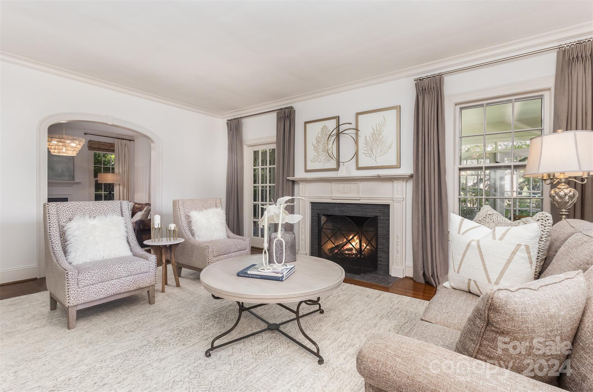 1900 South Wendover Road Charlotte, NC 28211 - Photo 6 of 38 a living room with furniture and a fireplace