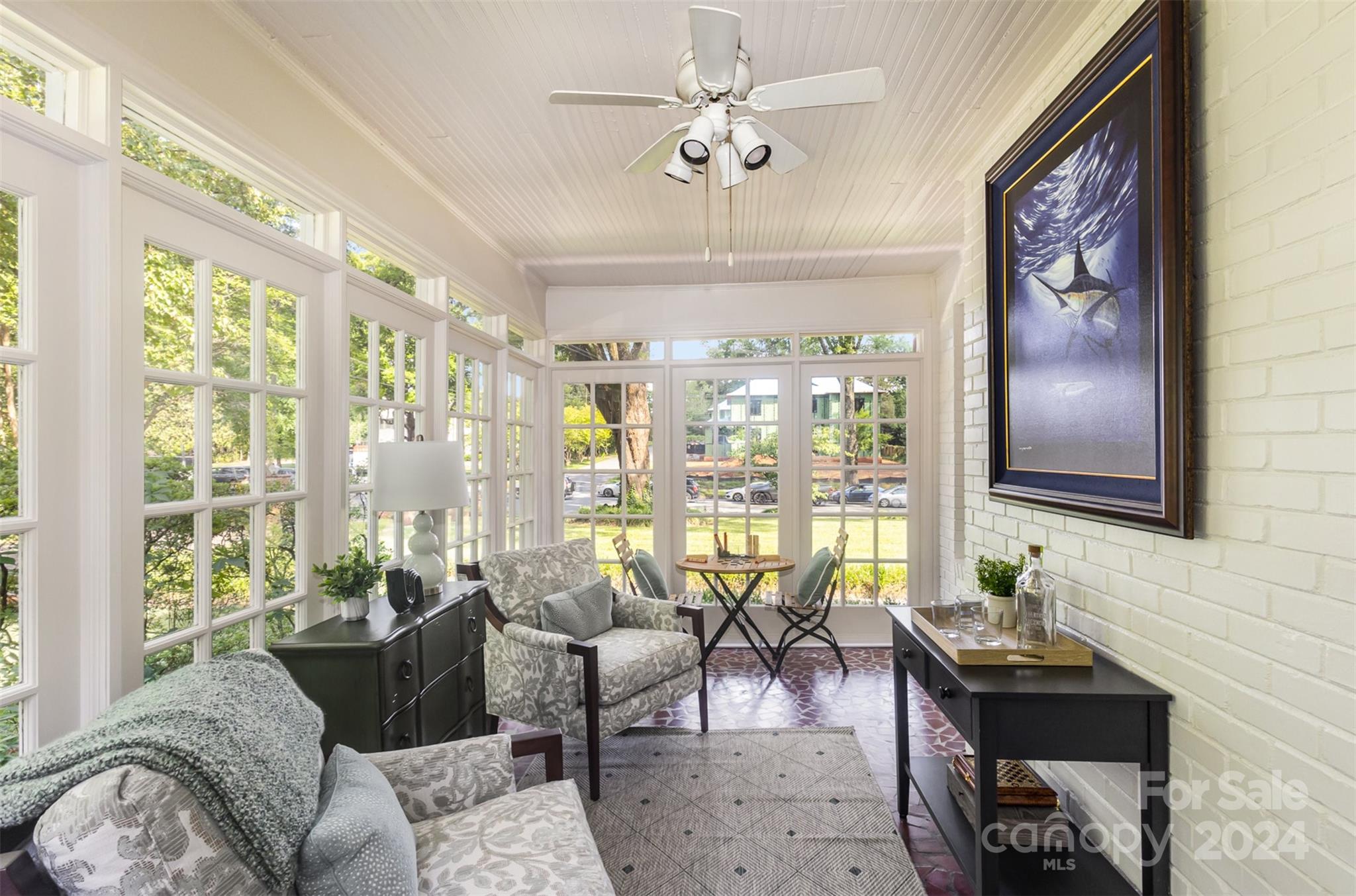 1900 South Wendover Road Charlotte, NC 28211 - Photo 7 of 38 a living room with furniture and a large window