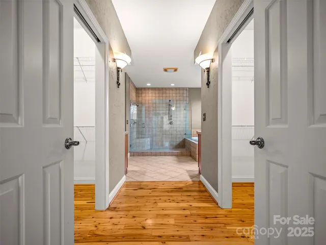 a bathroom with a granite countertop sink a toilet and bathtub