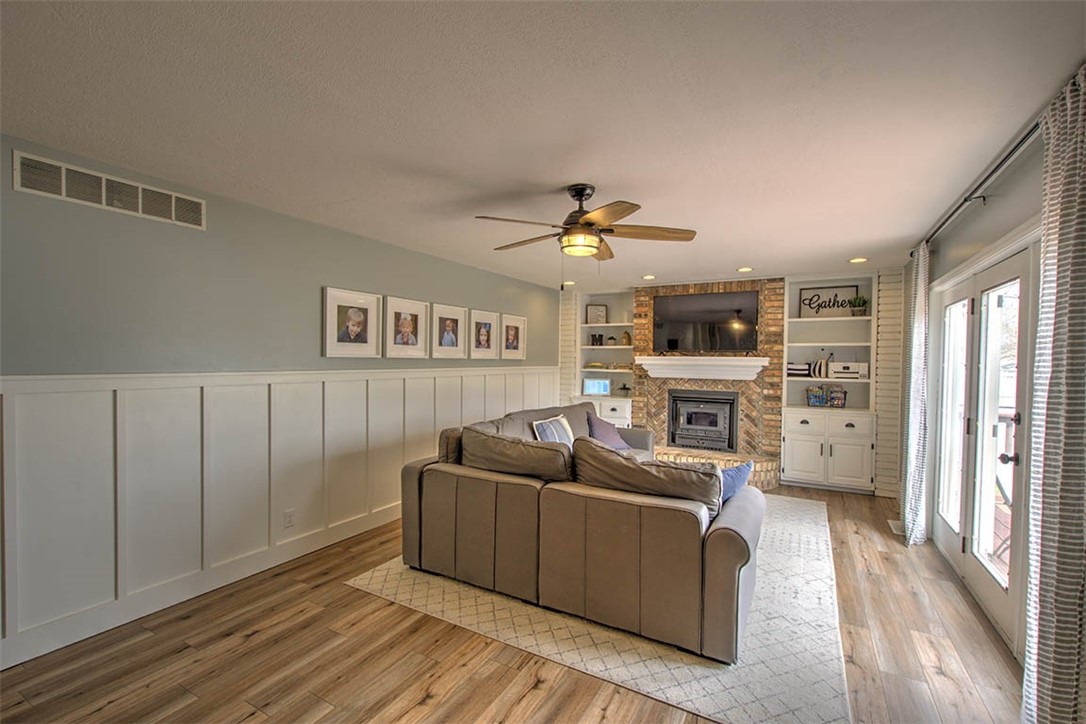 4670 Trevino Lane Decatur, IL 62526 - Photo 11 of 39 a living room with furniture and a fireplace