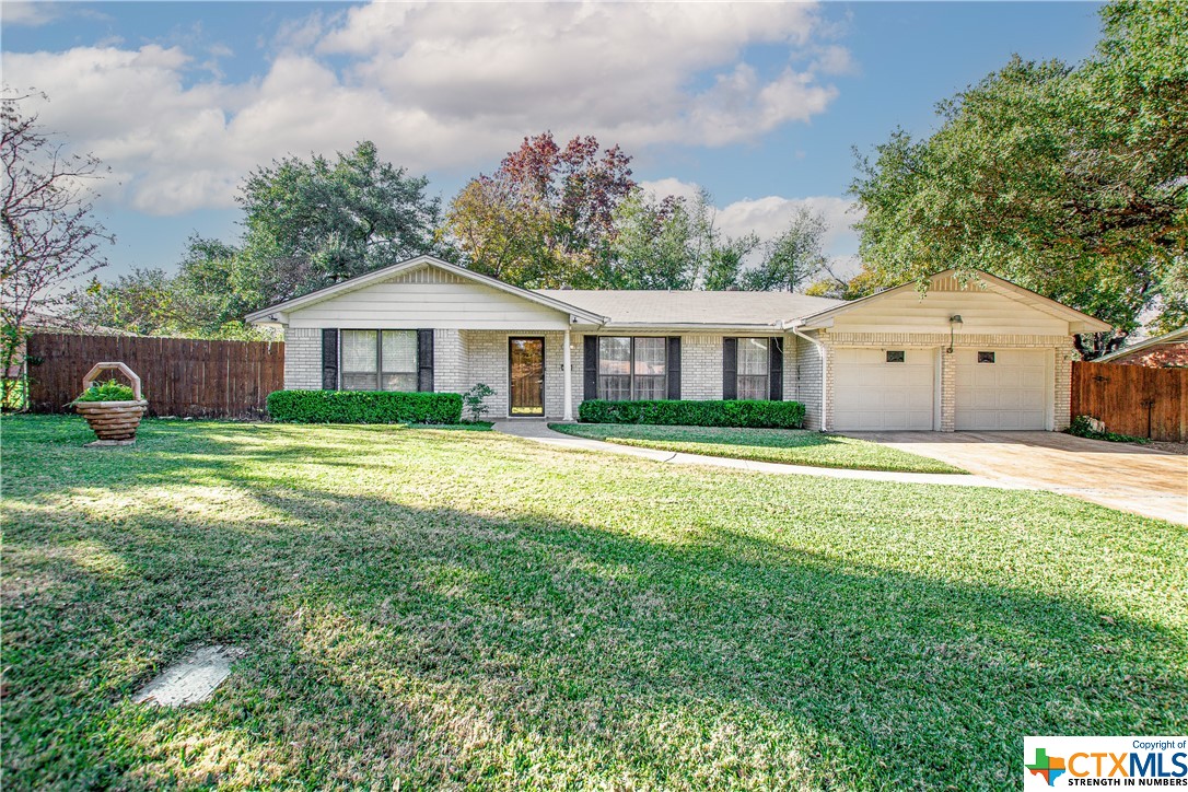 3205 Pin Oak Drive Temple, TX 76502 - Photo 1 of 1 a front view of a house with garden