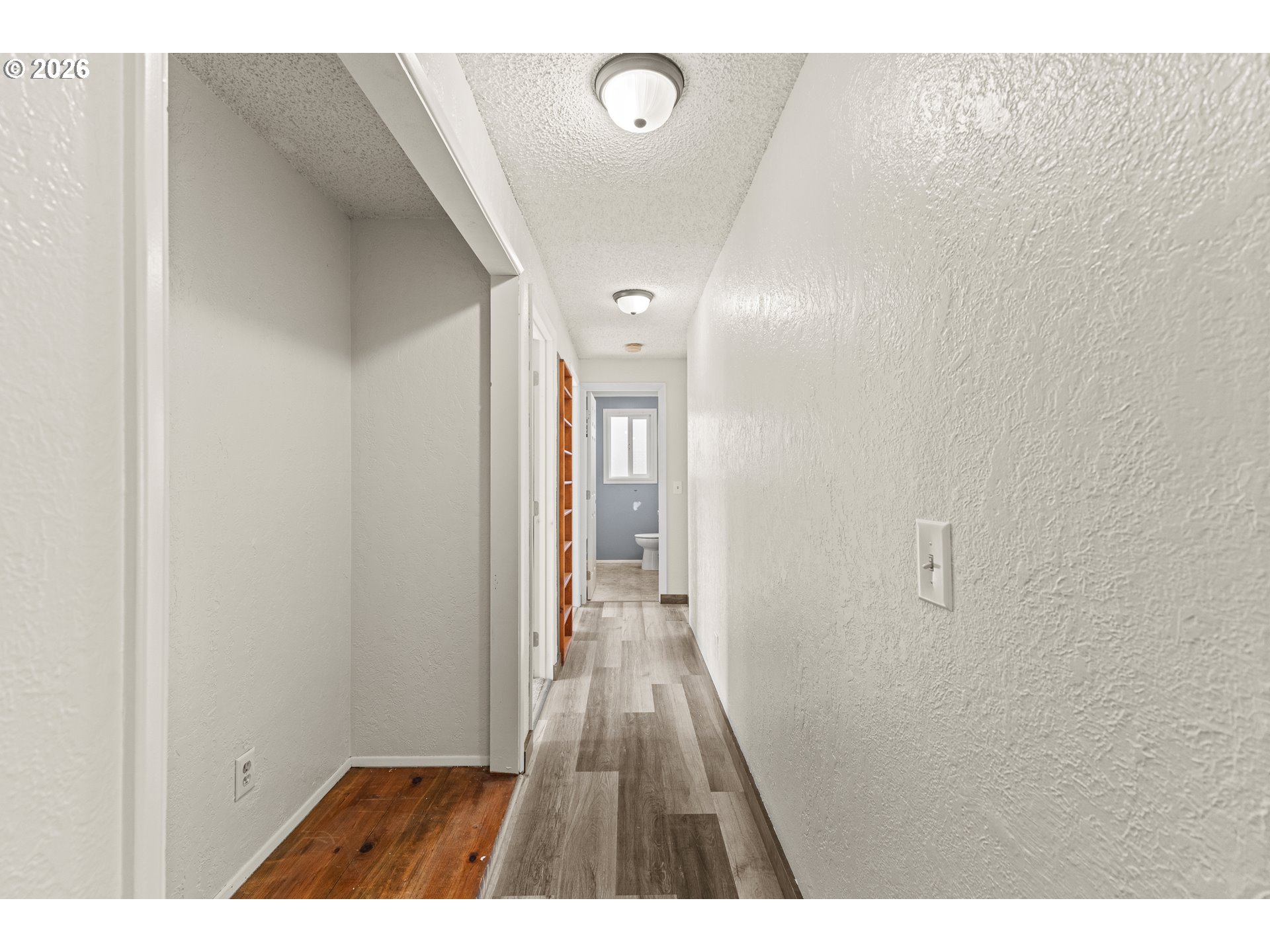 1816 Sunset Court Myrtle Point, OR 97458 - Photo 25 of 42 a view of hallway with wooden floor