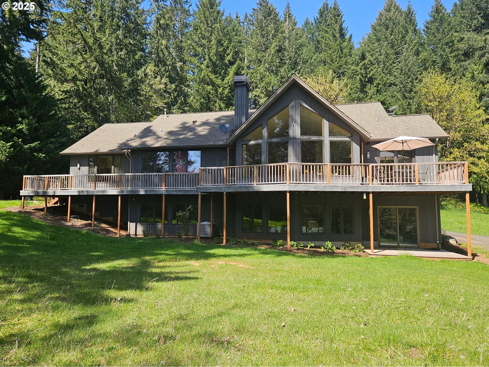 22500 Northwest Pihl Road Banks, OR 97106 - Photo 1 of 47 a front view of a house with a yard