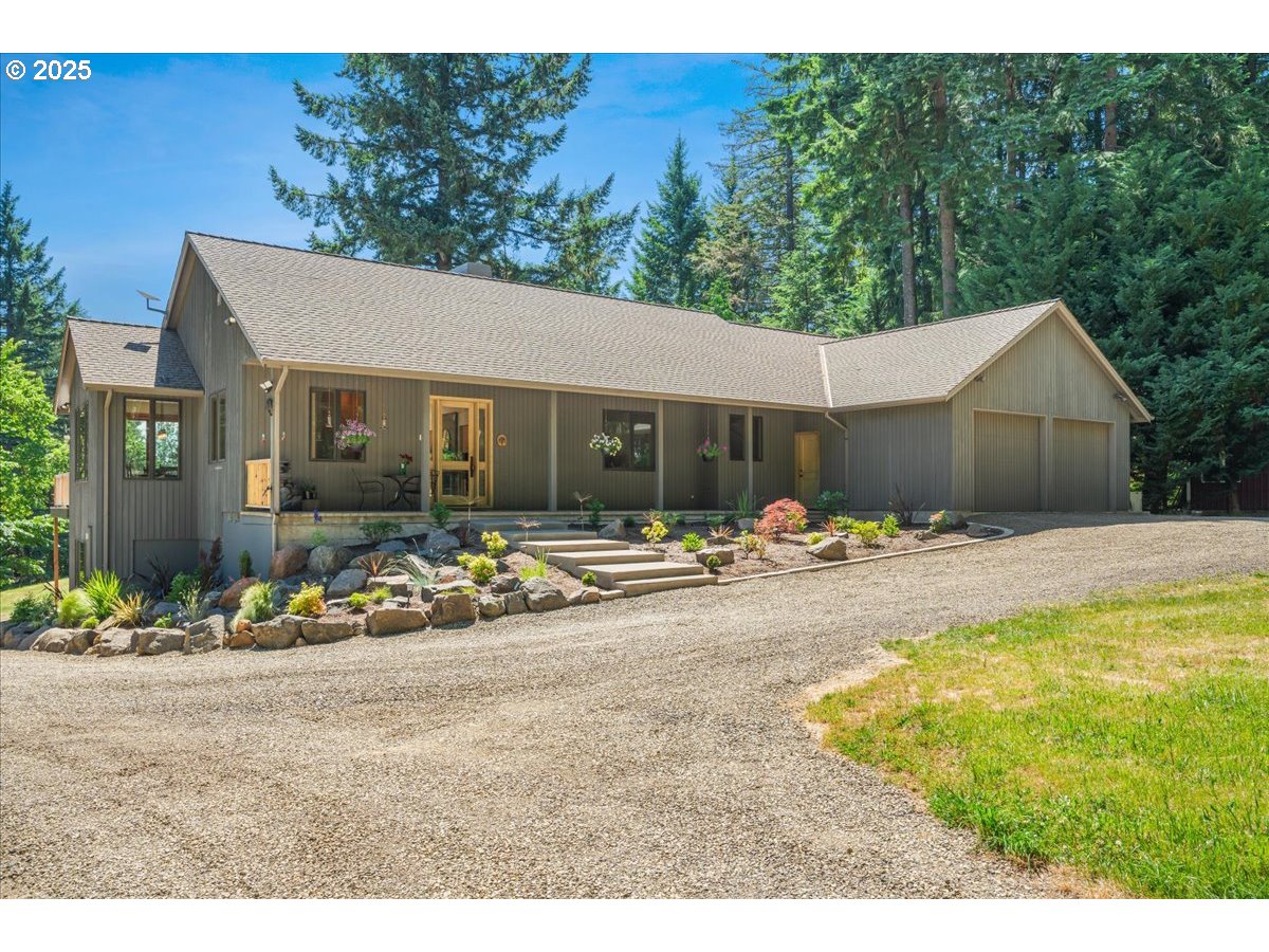 22500 Northwest Pihl Road Banks, OR 97106 - Photo 11 of 47 a view of a house with backyard and sitting area