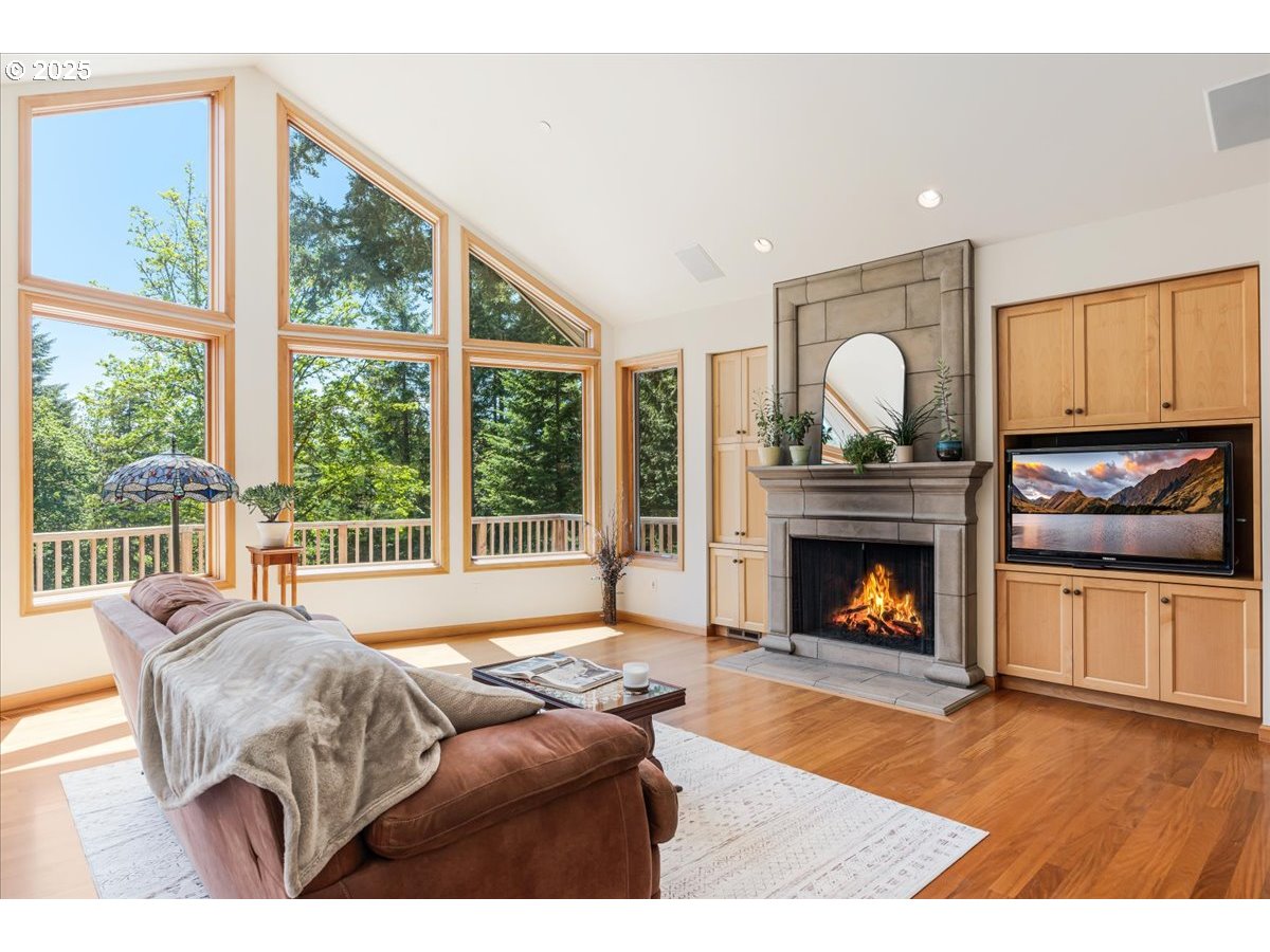 22500 Northwest Pihl Road Banks, OR 97106 - Photo 15 of 47 a living room with furniture and a fireplace