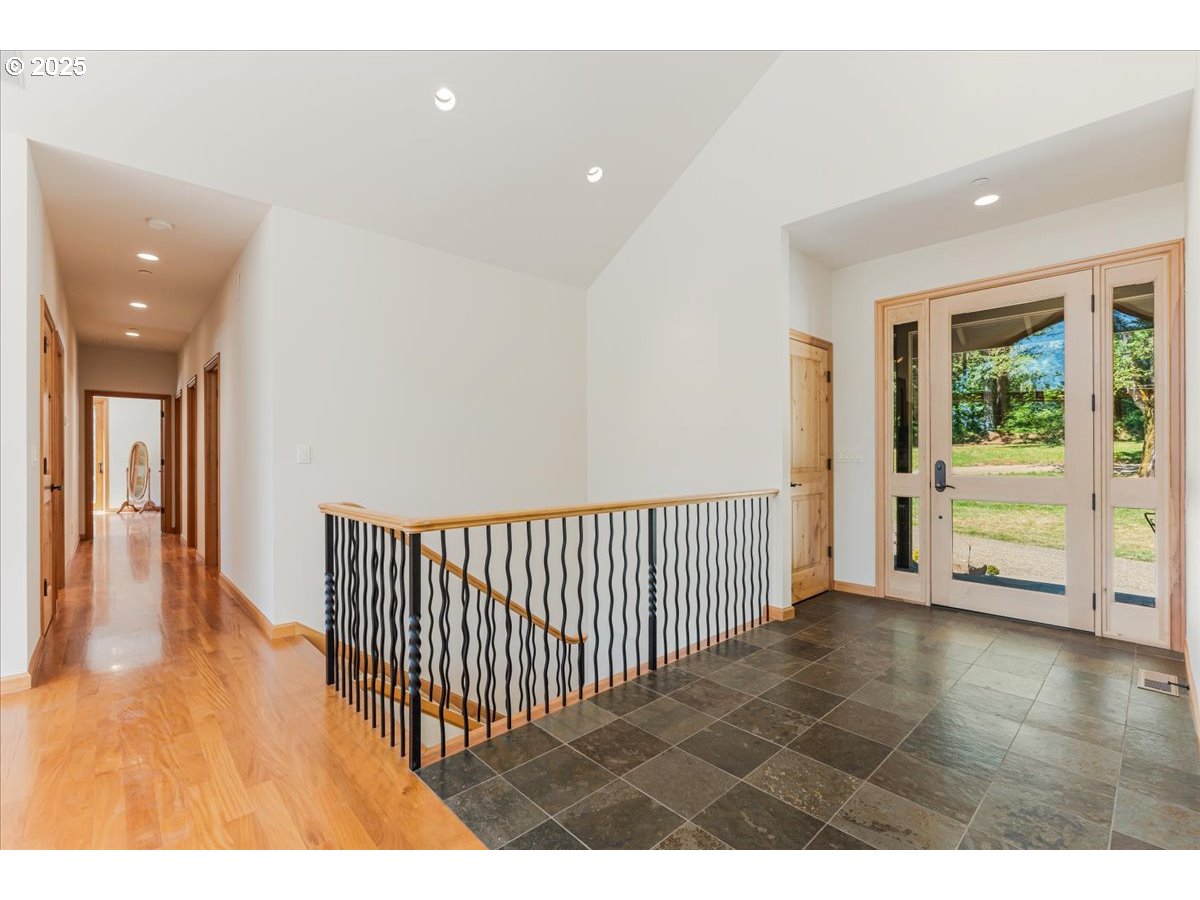 22500 Northwest Pihl Road Banks, OR 97106 - Photo 32 of 47 a view of a hallway with wooden floor and windows