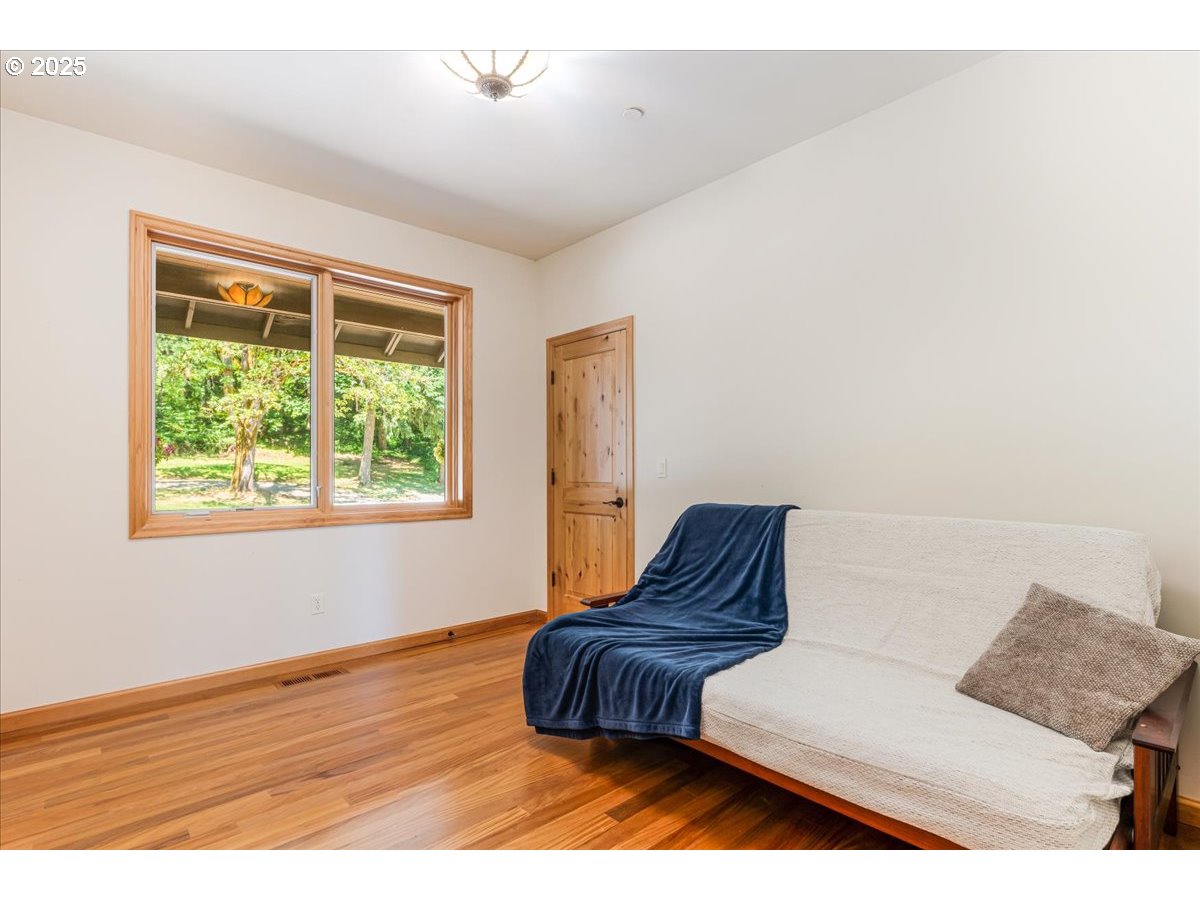 22500 Northwest Pihl Road Banks, OR 97106 - Photo 35 of 47 a living room with furniture and a window