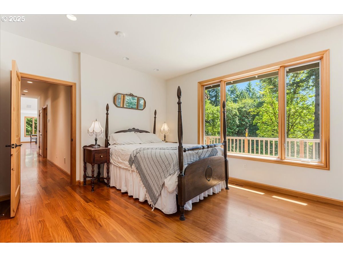 22500 Northwest Pihl Road Banks, OR 97106 - Photo 37 of 47 a bedroom with a bed and a large window