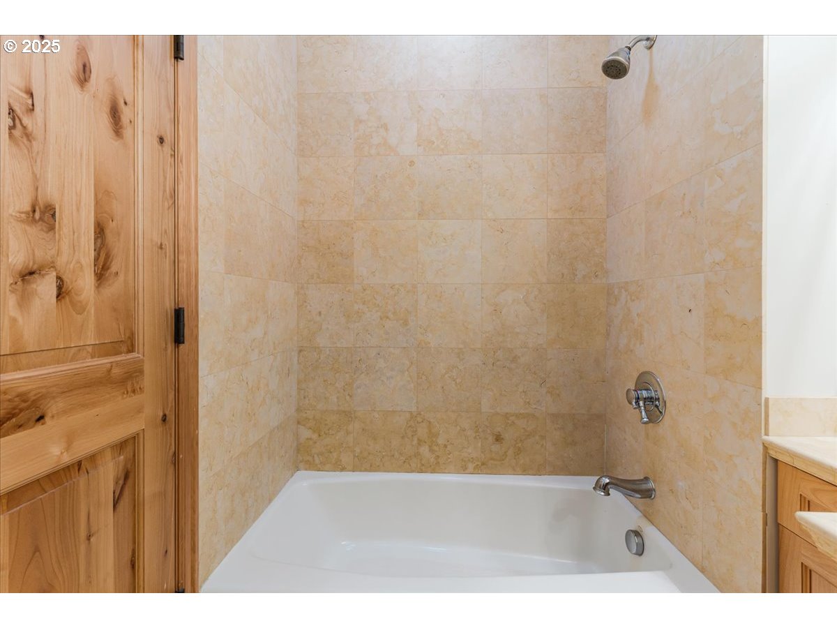 22500 Northwest Pihl Road Banks, OR 97106 - Photo 42 of 47 a bathroom with a shower and a sink