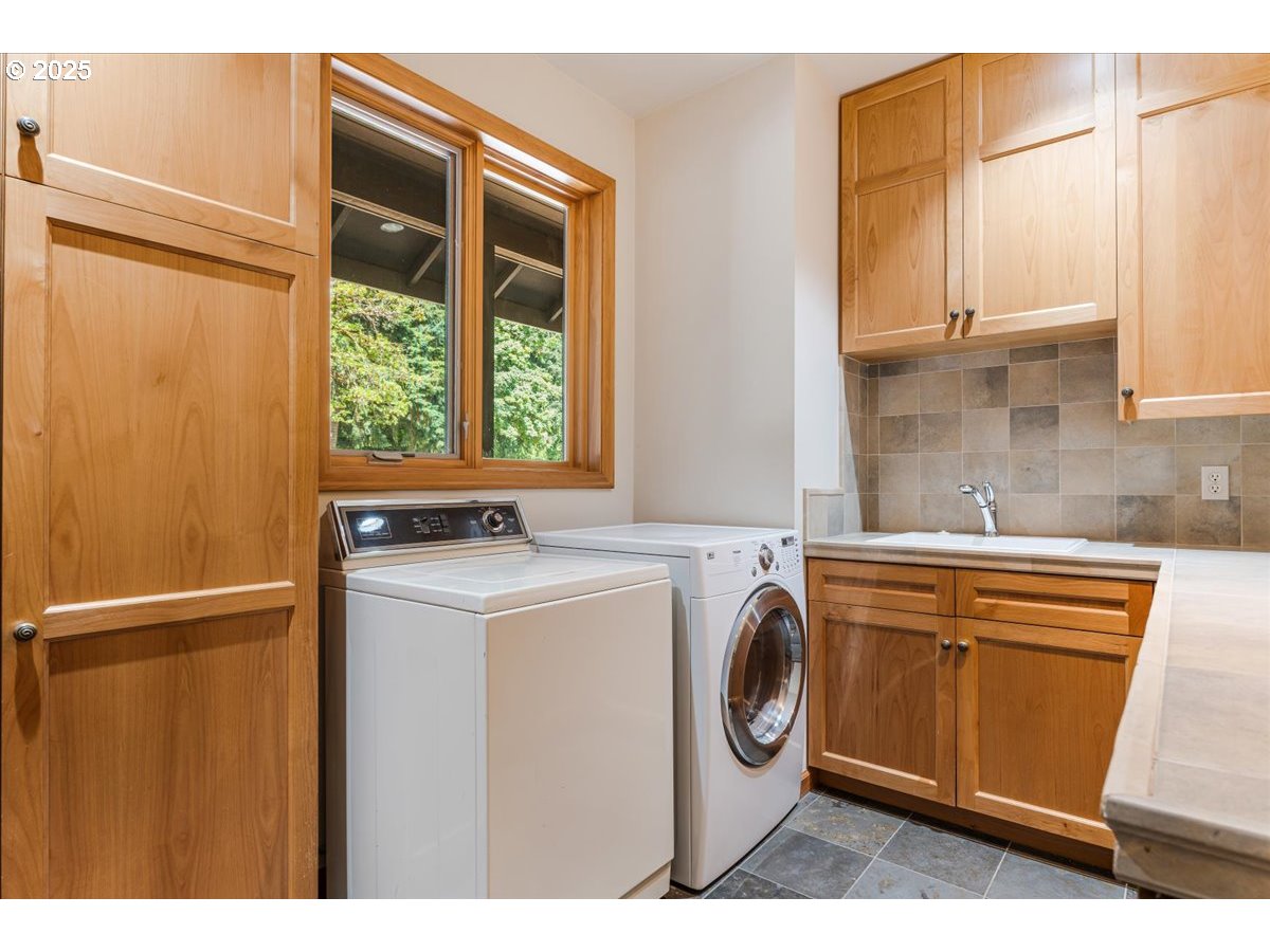 22500 Northwest Pihl Road Banks, OR 97106 - Photo 43 of 47 a utility room with dryer and washer