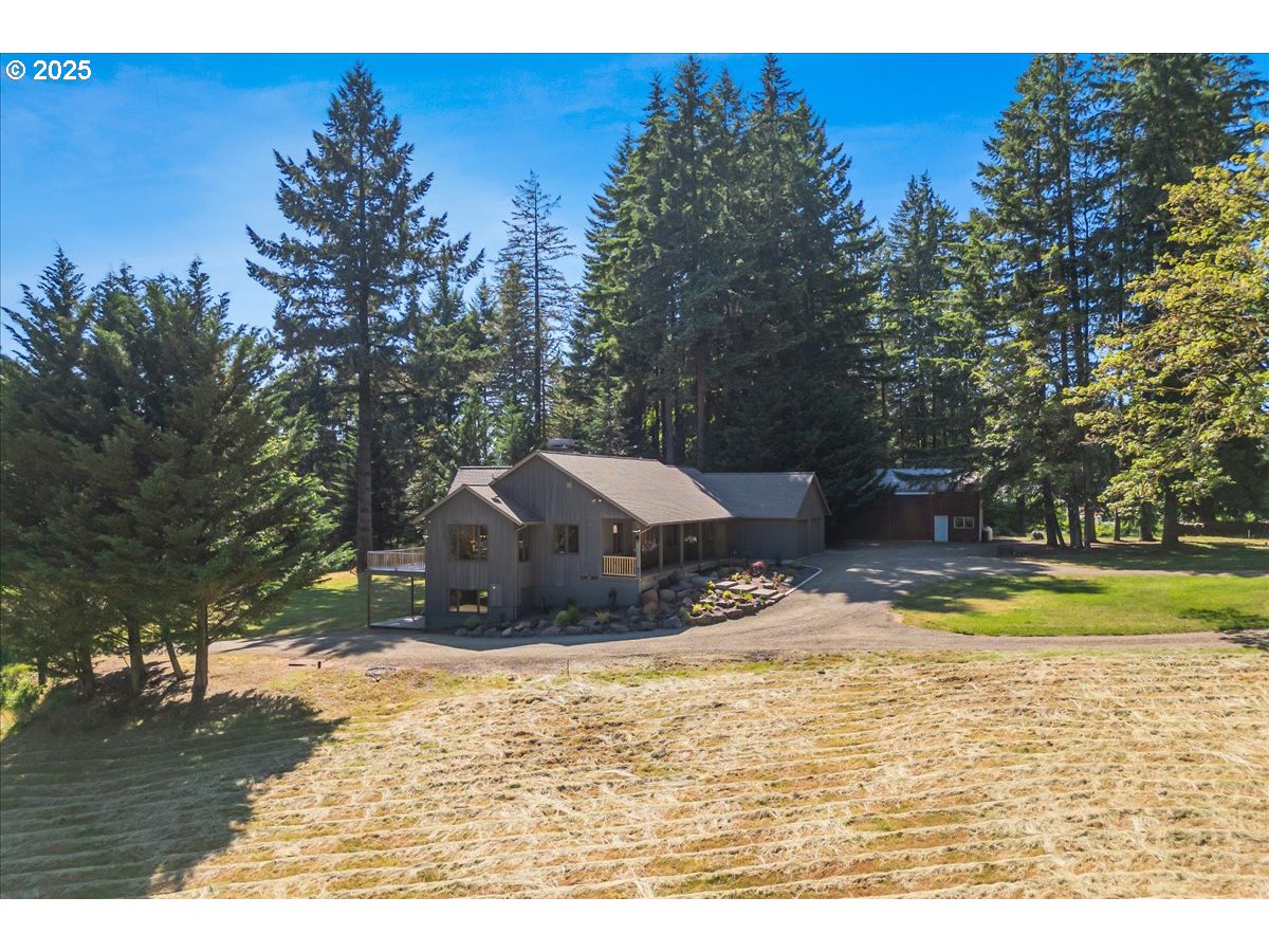 22500 Northwest Pihl Road Banks, OR 97106 - Photo 5 of 47 a view of a yard with an outdoor space