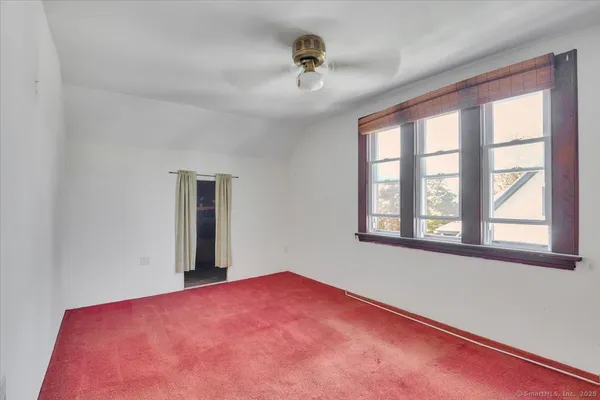 a view of a room with a window