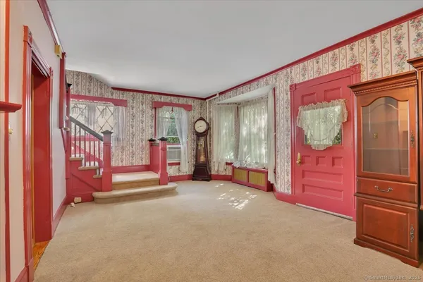 a view of an empty room and window