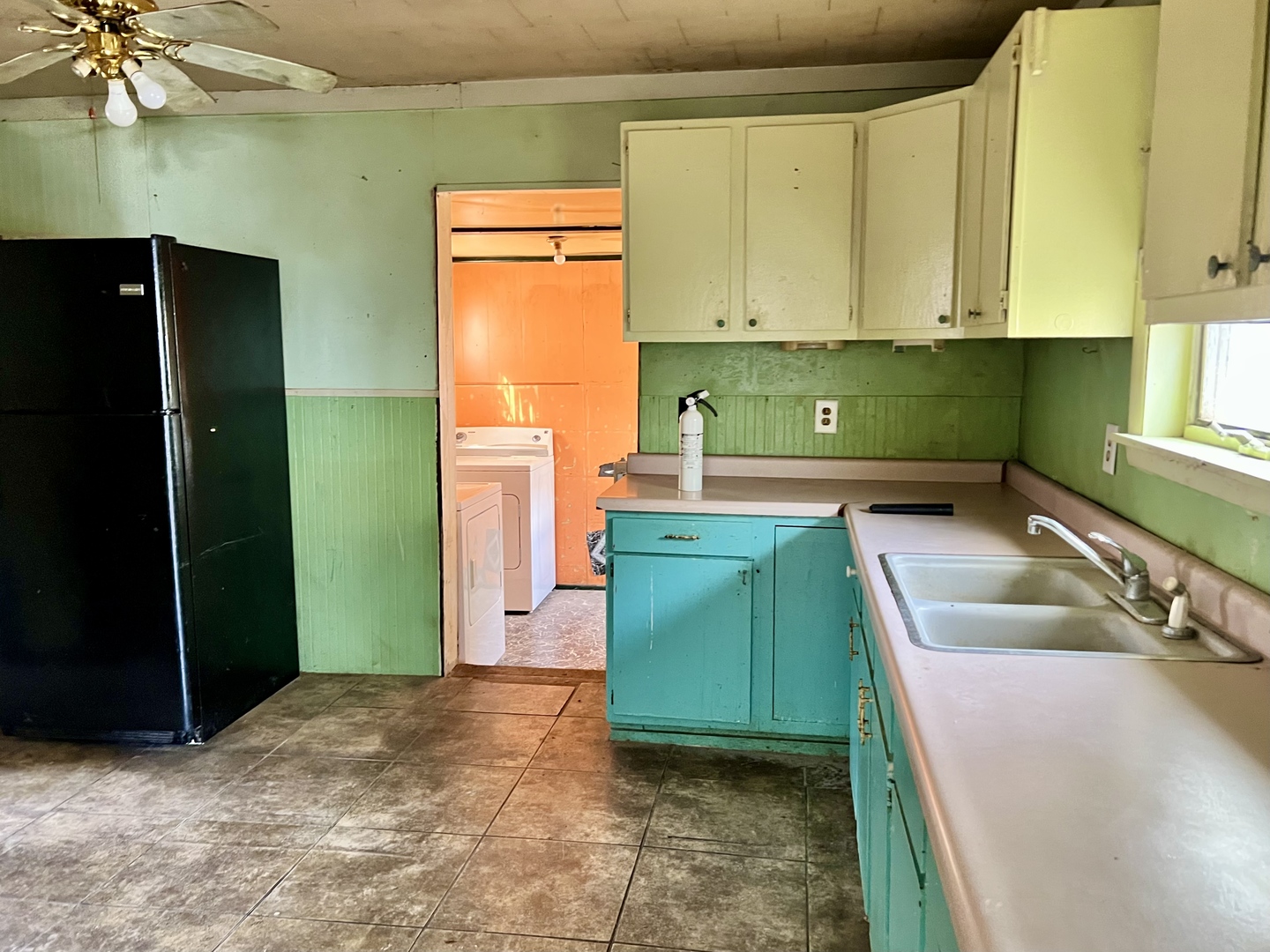 710 West Main Street Hoopeston, IL 60942 - Photo 9 of 25 a kitchen with a sink and cabinets