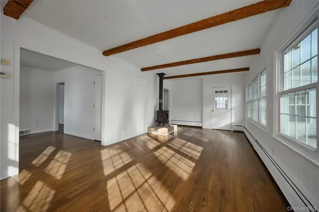 a view of an empty room and window