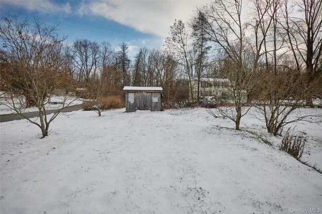 a view of a snow with a bench
