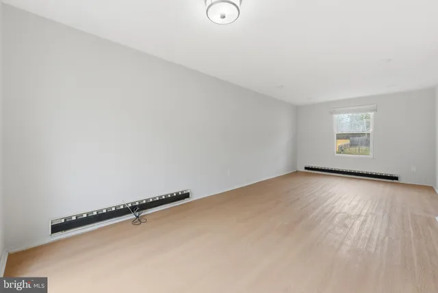 an empty room with a window