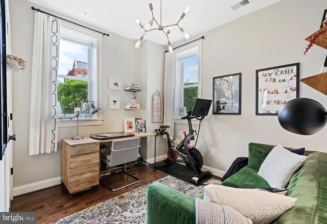 a room with furniture and a window