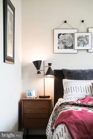 a bedroom with bed and window