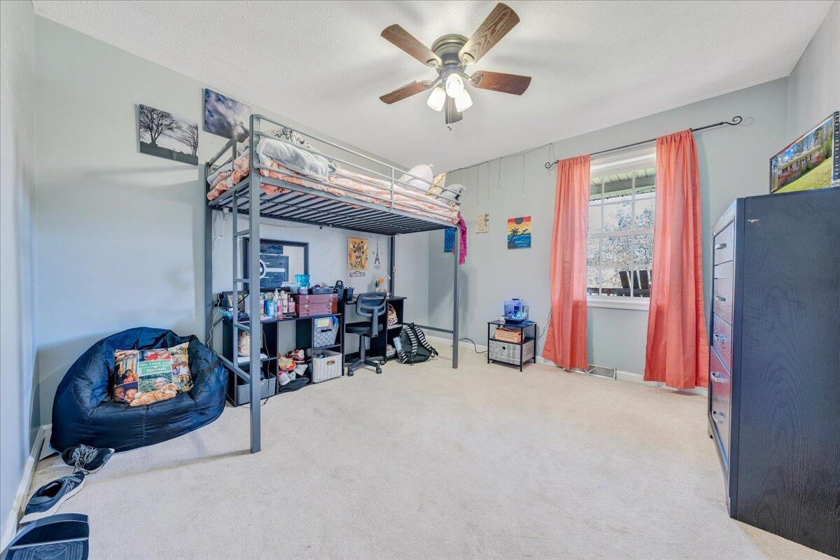 5497 Bethany Road Rustburg, VA 24588 - Photo 17 of 52 a view of a room with gym equipment