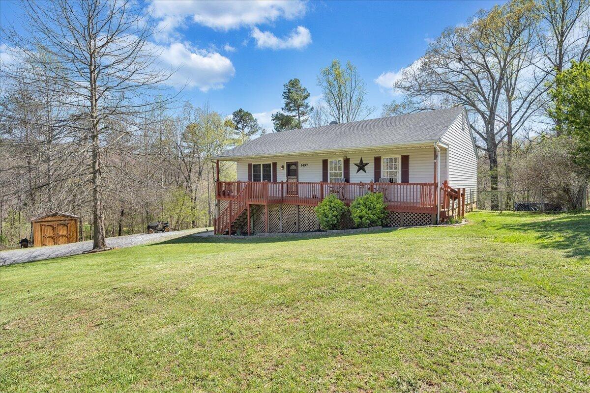 5497 Bethany Road Rustburg, VA 24588 - Photo 29 of 52 a view of a house with backyard and garden