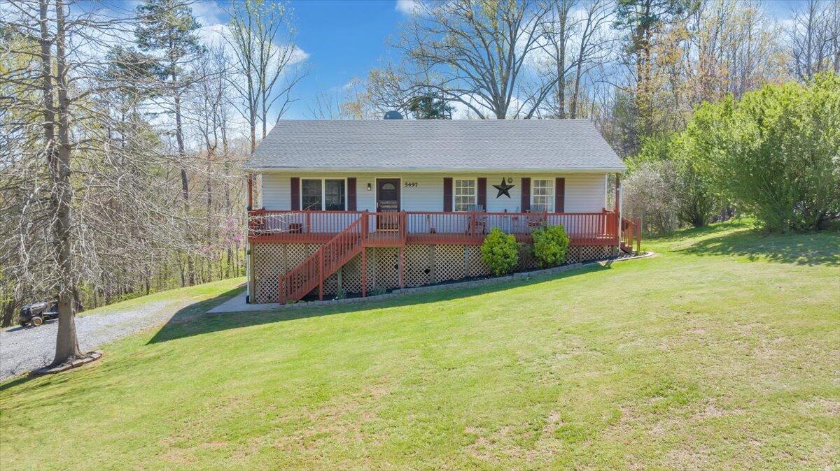 5497 Bethany Road Rustburg, VA 24588 - Photo 36 of 52 a view of a house with backyard and a tree