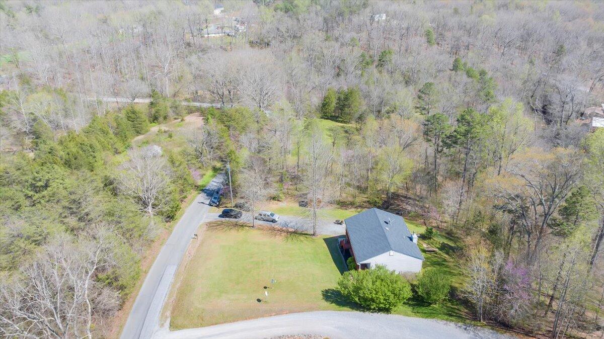 5497 Bethany Road Rustburg, VA 24588 - Photo 40 of 52 a view of a yard with large trees