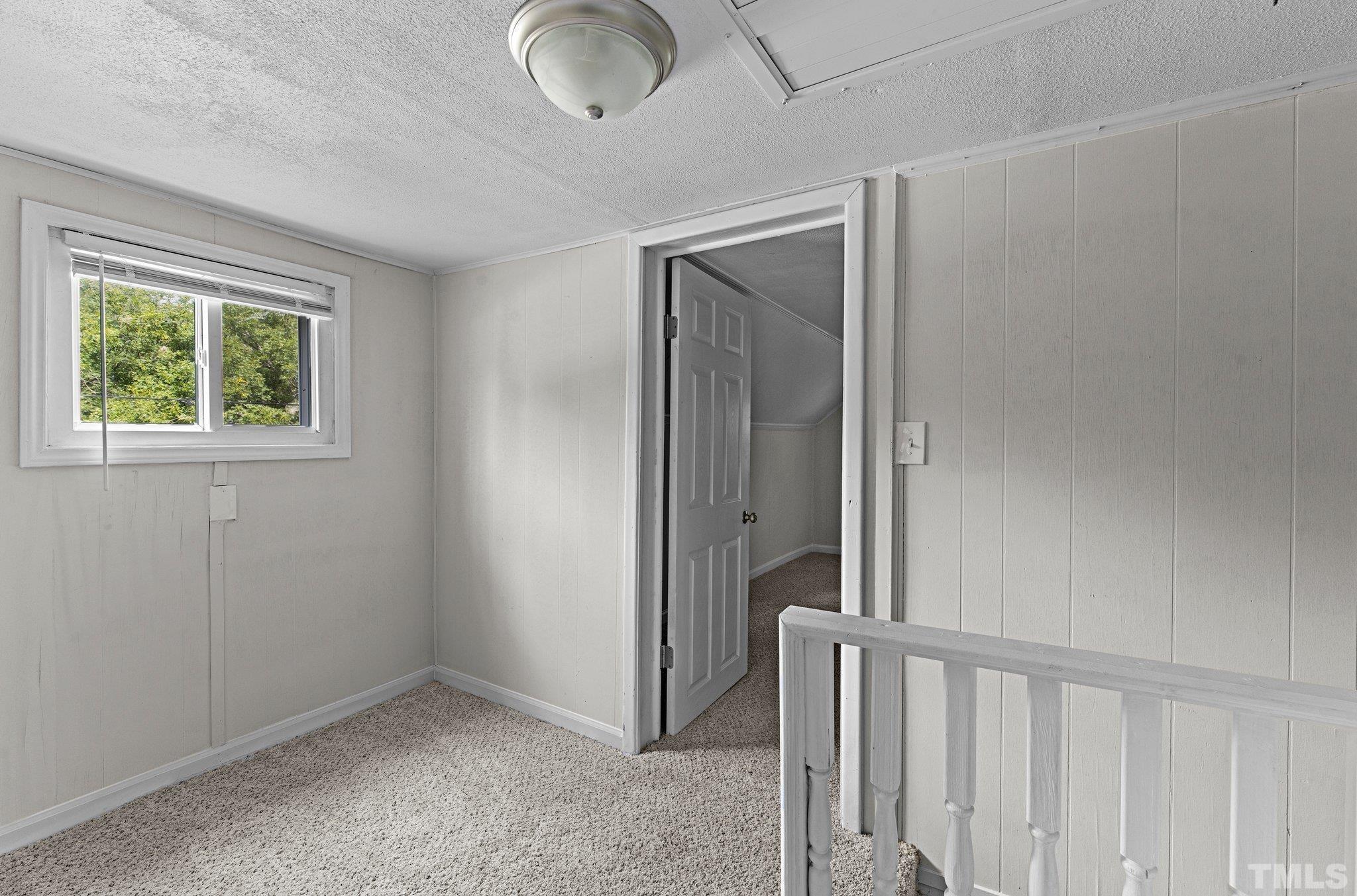 305 West Horton Street Zebulon, NC 27597 - Photo 21 of 29 an empty room with windows