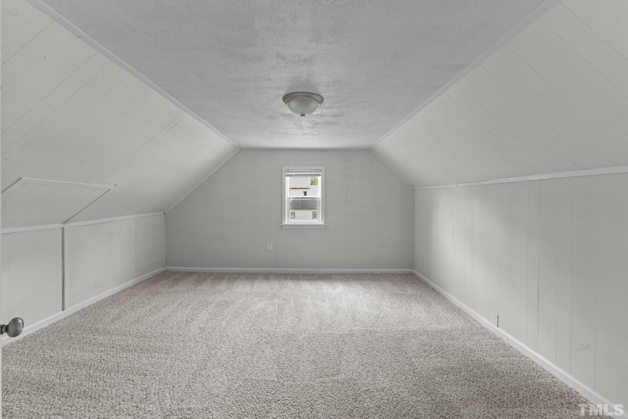 305 West Horton Street Zebulon, NC 27597 - Photo 22 of 29 an empty room with a window