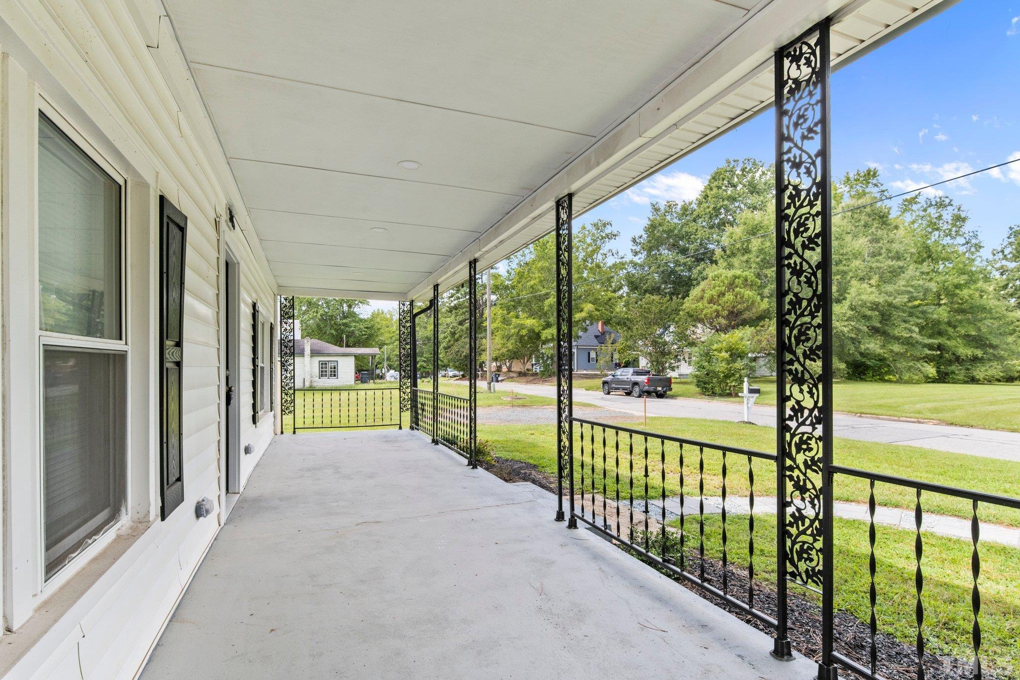 305 West Horton Street Zebulon, NC 27597 - Photo 5 of 29 a view of a room with balcony