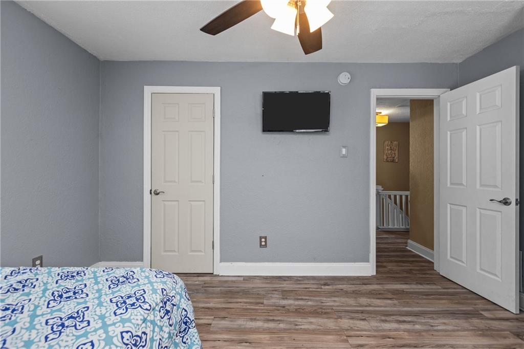 325 East Grant Street Houston, PA 15342 - Photo 21 of 33 a bedroom with a bed and a flat screen tv