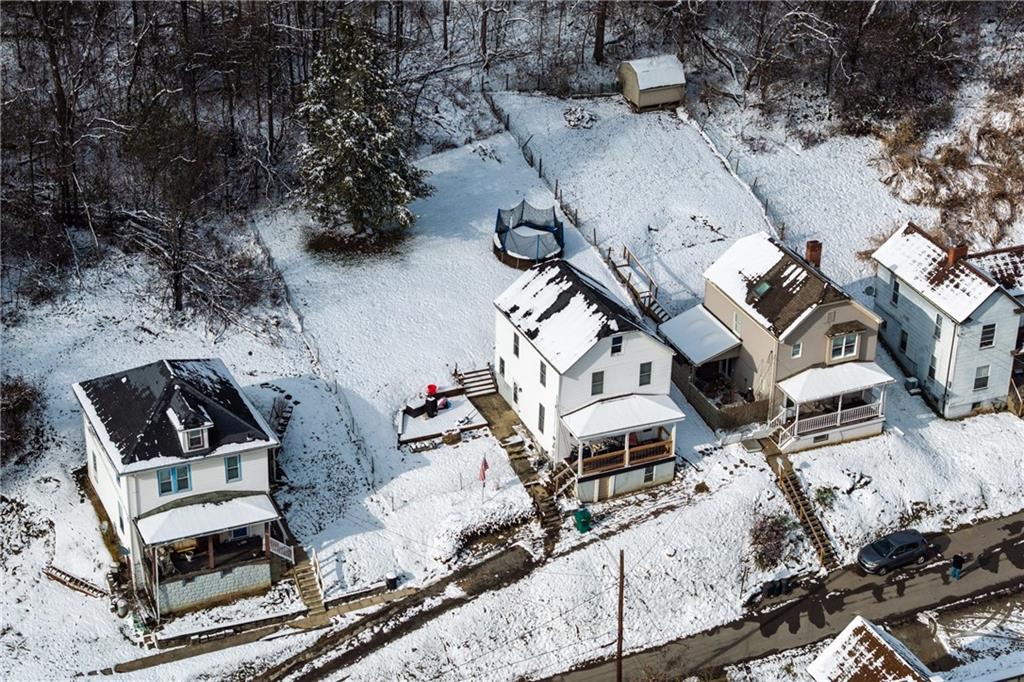 325 East Grant Street Houston, PA 15342 - Photo 30 of 33 a view of a house with roof deck