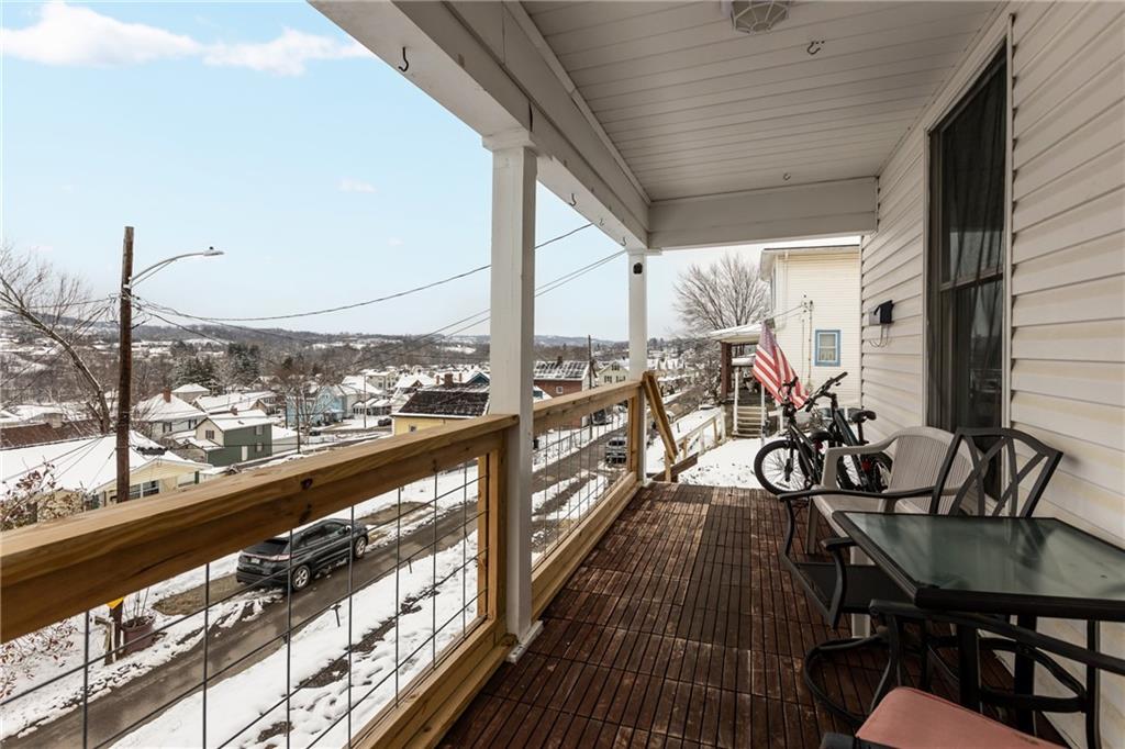 325 East Grant Street Houston, PA 15342 - Photo 32 of 33 a view of a balcony with chairs