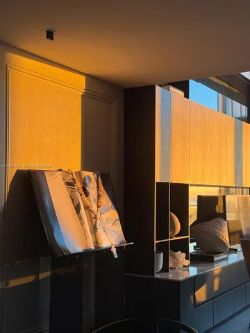 a terrace with outdoor seating and city view