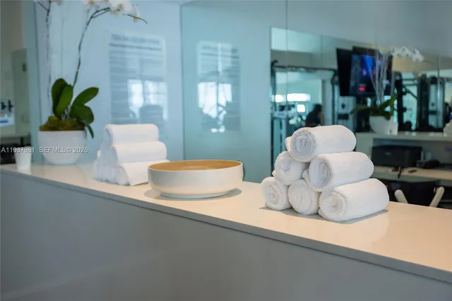 a view of an entryway and wooden floor