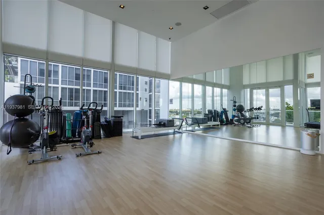 a view of backyard of house with outdoor seating