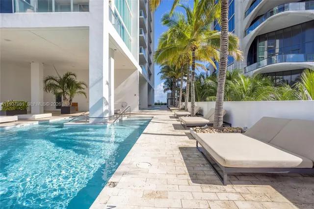a view of a living room area with furniture