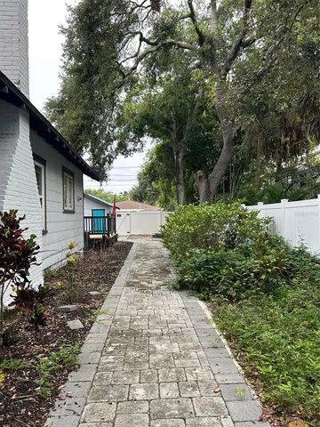 a view of a back yard with green space