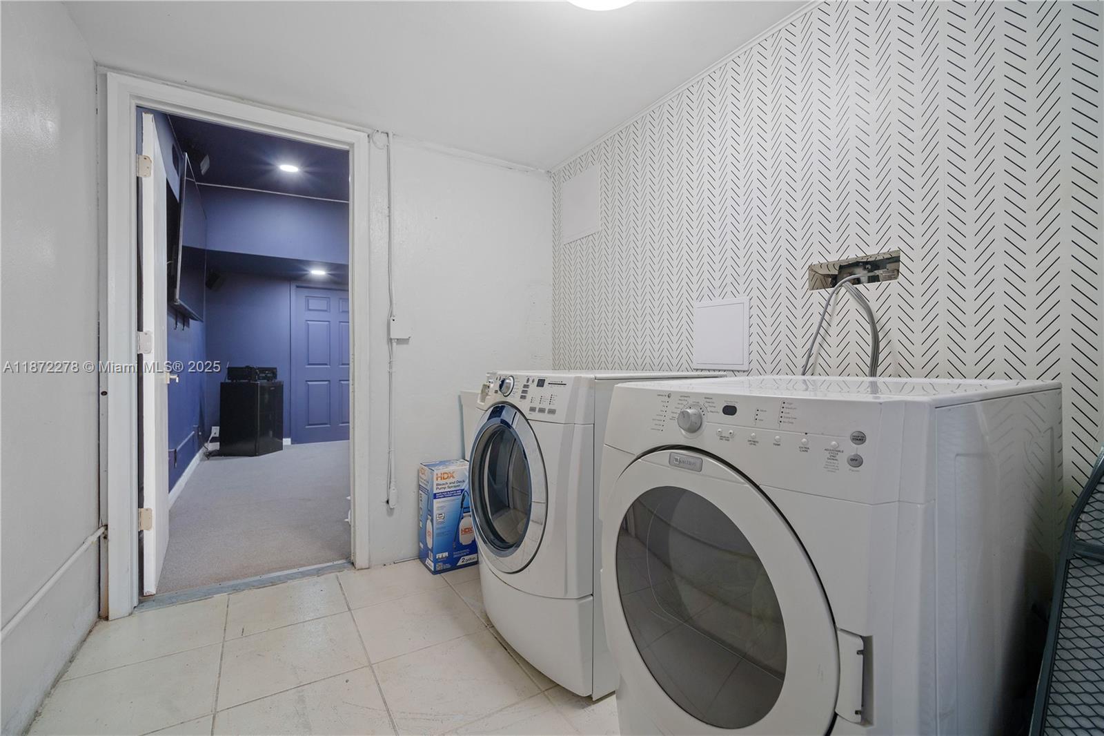 951 Northwest 148th Street Miami, FL 33168 - Photo 27 of 34 a view of a hallway with washer and dryer