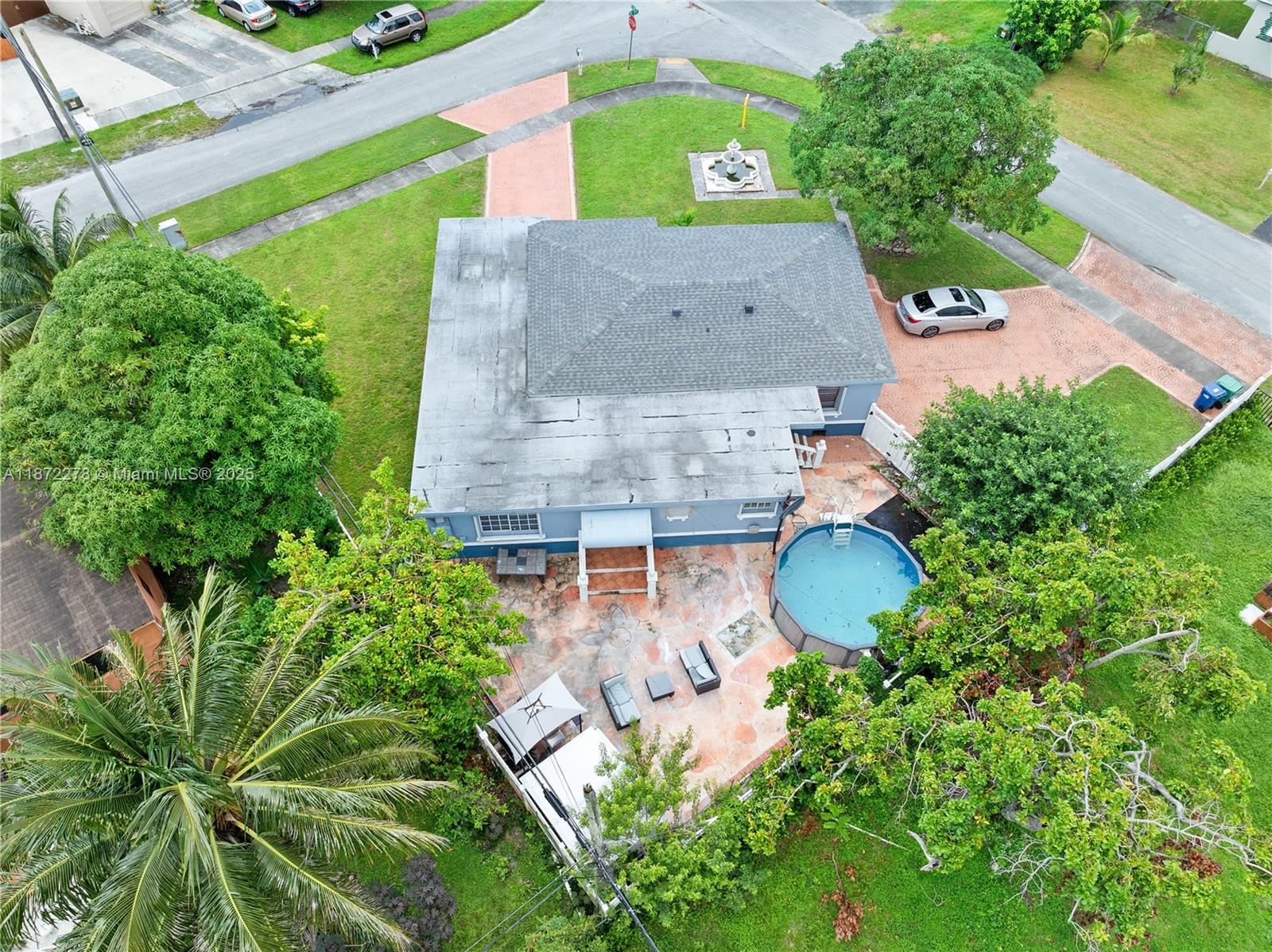 951 Northwest 148th Street Miami, FL 33168 - Photo 33 of 34 an aerial view of a house with outdoor space and street view