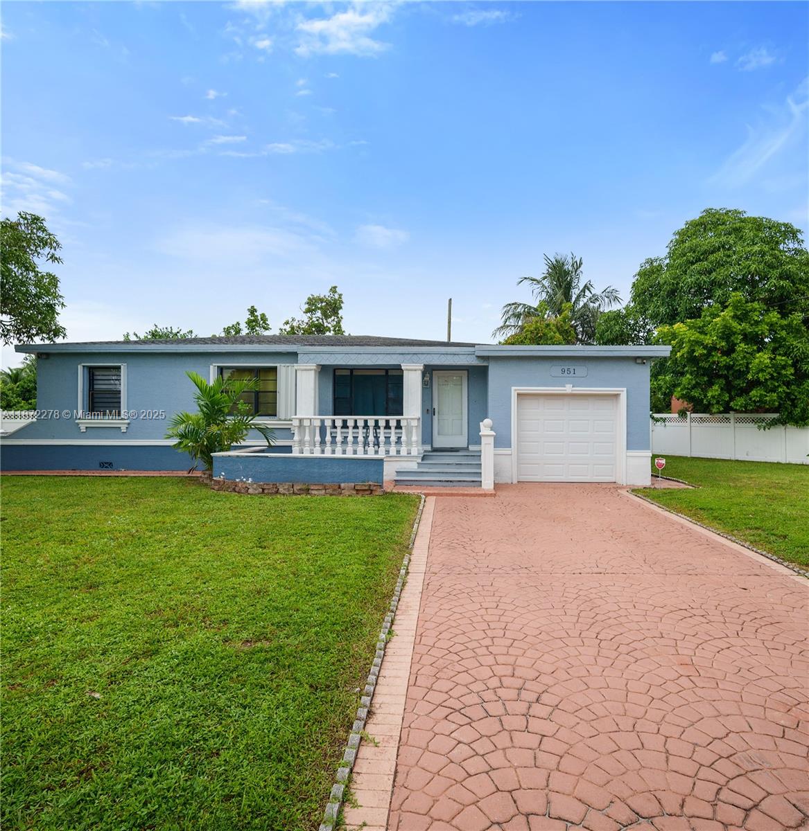 951 Northwest 148th Street Miami, FL 33168 - Photo 6 of 34 a front view of house with yard and green space
